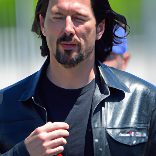 Keanu Reeves a debutat ca pilot de curse auto la Indianapolis Motor ...